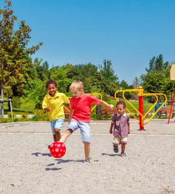 Excited Young Children Running And Playing