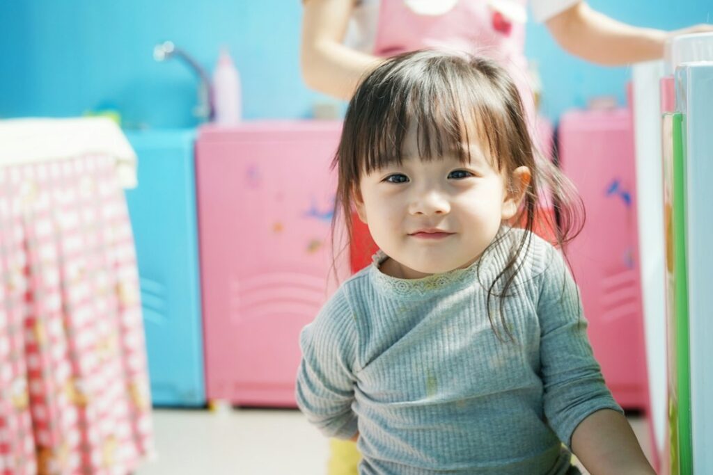 Young Child In A Bright Learning Environment Illustrating Infant Care And Safety Tips For Findlay Ohio Families